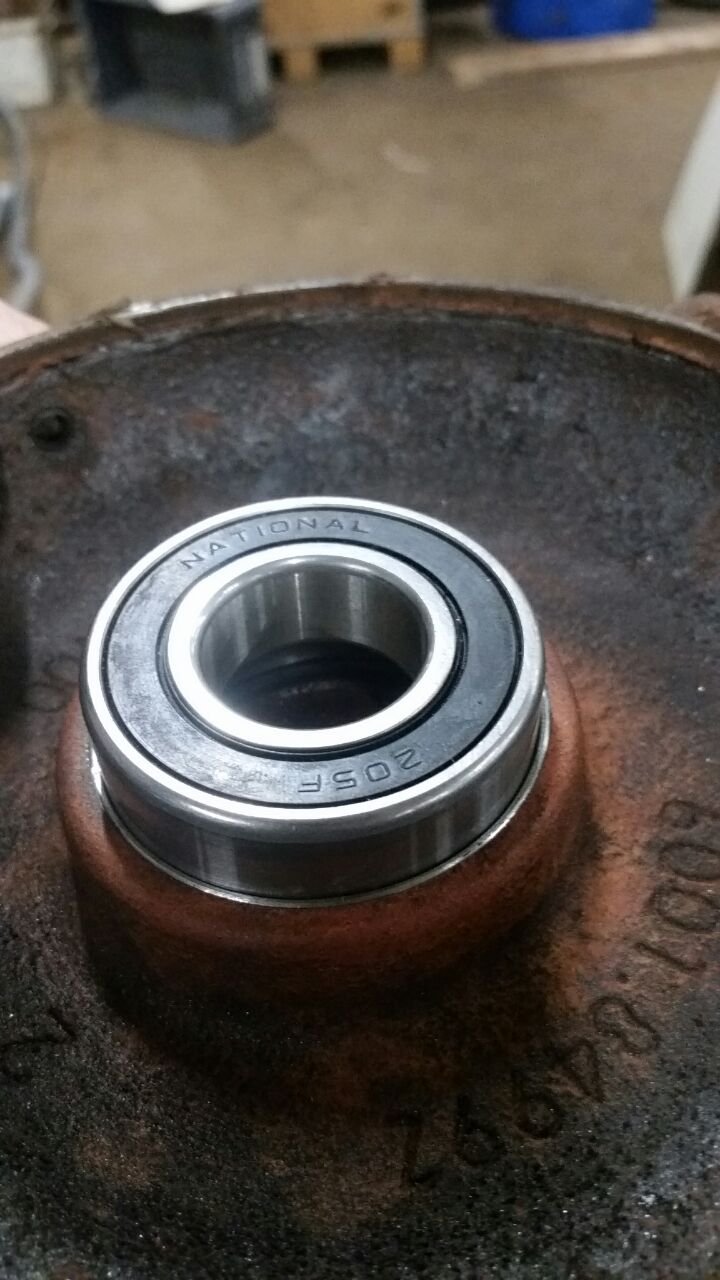 Housing of a motor. Bearing seat worn out due to a worn bearing.  New bushing fits new bearing