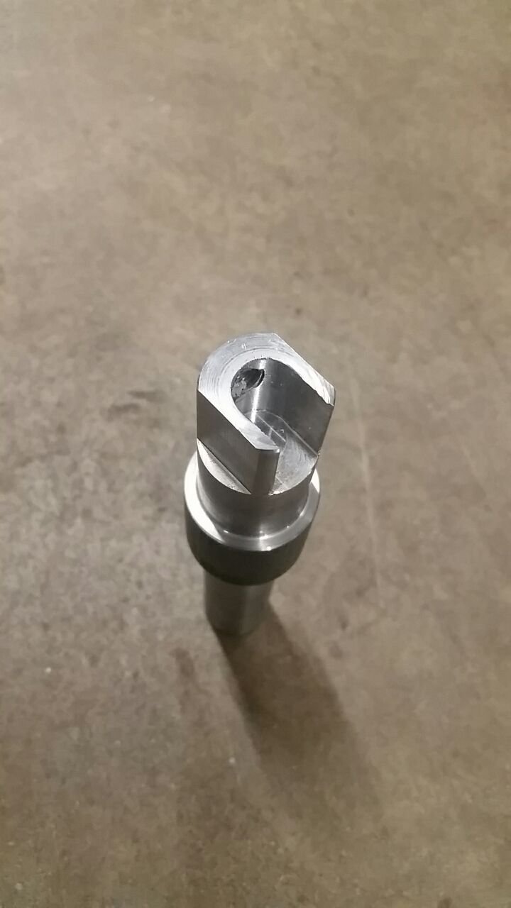 This part was made on a CNC Lathe using live tooling